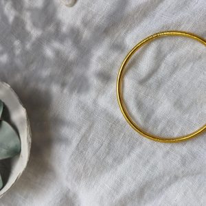 Jonc bouddhiste doré fin